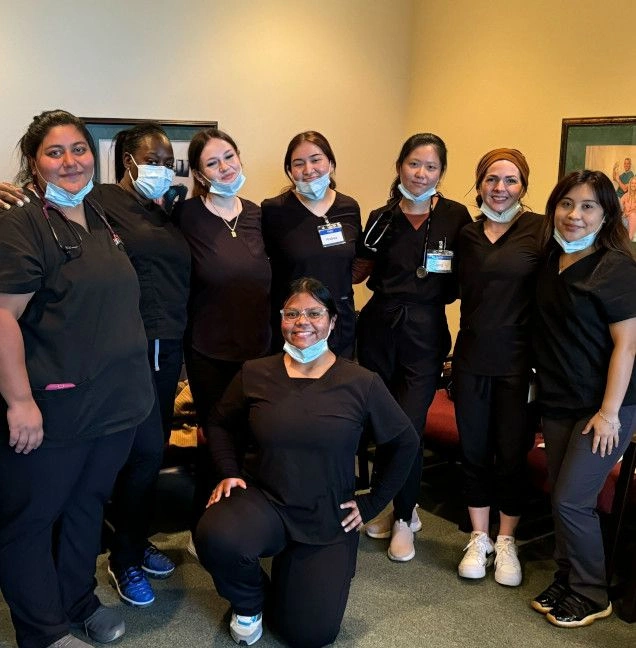 students posing in group photo students posing in group photo